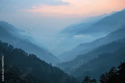 misty mountains at sunset © urdialex