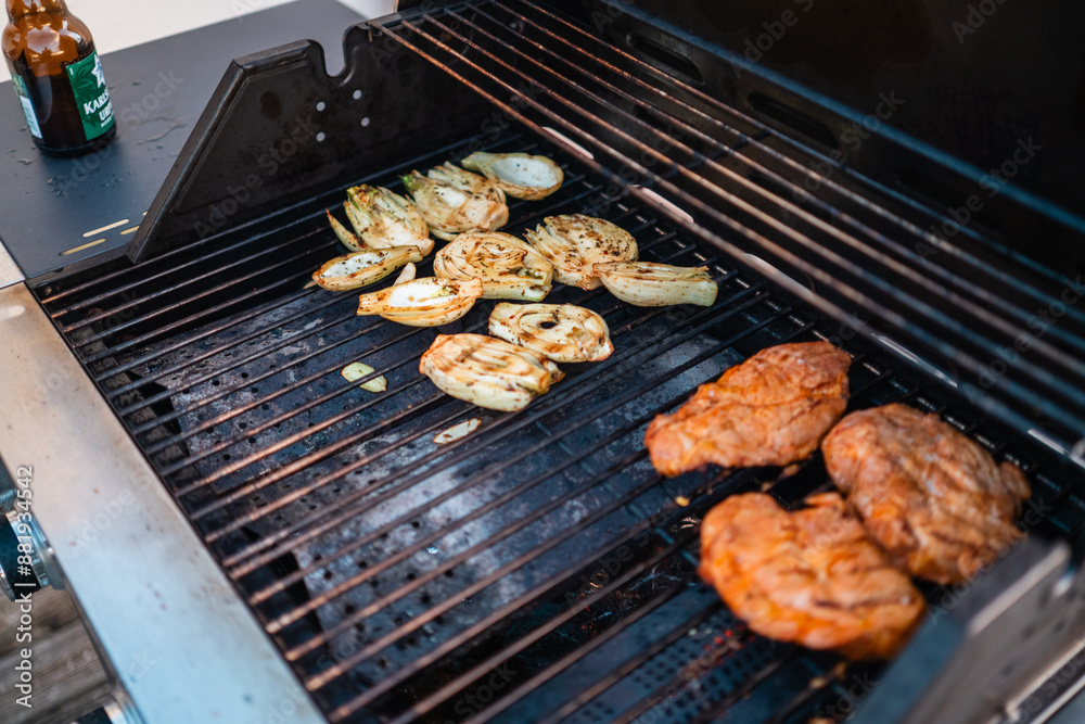 Steaks and Vegetables Roasted on a Big Home Gas Grill with Hot Flames Grilling the Food During Summer Season on a Sunny Day Steaks and Vegetables Roasted on a Big Home Gas Grill with Hot Flames Grilling the Food During Summer Season on a Sunny Day