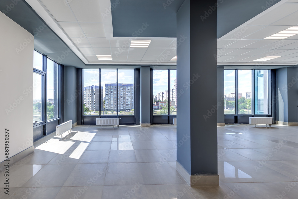 Fototapeta premium panorama view in empty modern hall with columns, doors and panoramic windows.