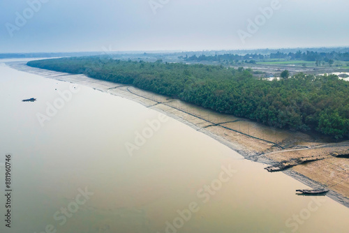 Aerial view of Sundarbans mangroves forest with water channels and rivers. Natural Indian reserve. Pristine rural habitat in the countryside of Indiav photo