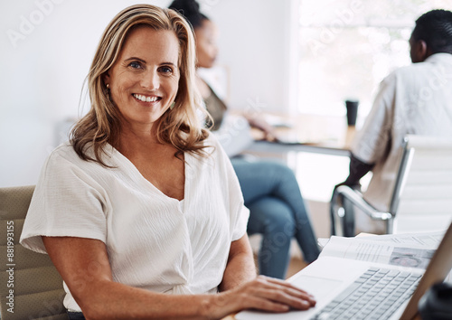 Laptop, portrait and mature woman in office for strategic planning, budget and application review on internet. Female HR manager, tech or happy with feedback for financial portfolio, success and info