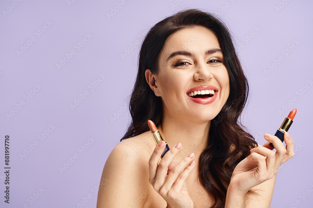 A beautiful woman gracefully holds a lipstick in her hand. A beautiful woman gracefully holds a lipstick in her hand.
