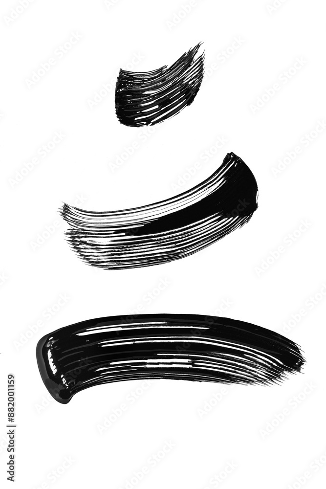 Black mascara brush strokes isolated on white Black mascara brush strokes isolated on white