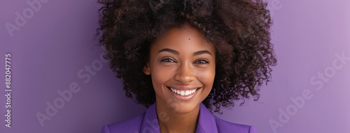 Smiling Woman With Curly Hair Against Purple Background