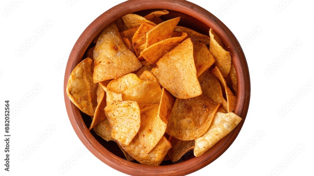 A bowl of crispy chips on a clean white surface A bowl of crispy chips on a clean white surface