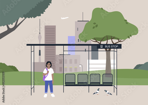 A child, adorned with a purple backpack, waits patiently at a city bus stop, the bustling cityscape forming a backdrop to their tranquil anticipation