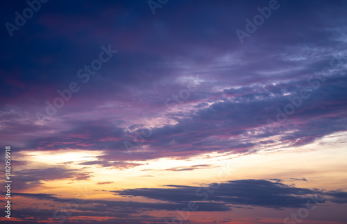 Dramatic dark moody purple and orange sunset sky. Natural background