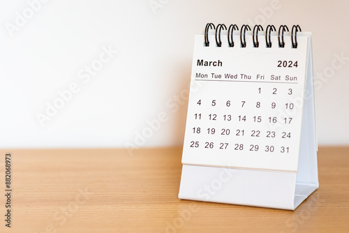 2024 calendar - March month page on the wooden desk