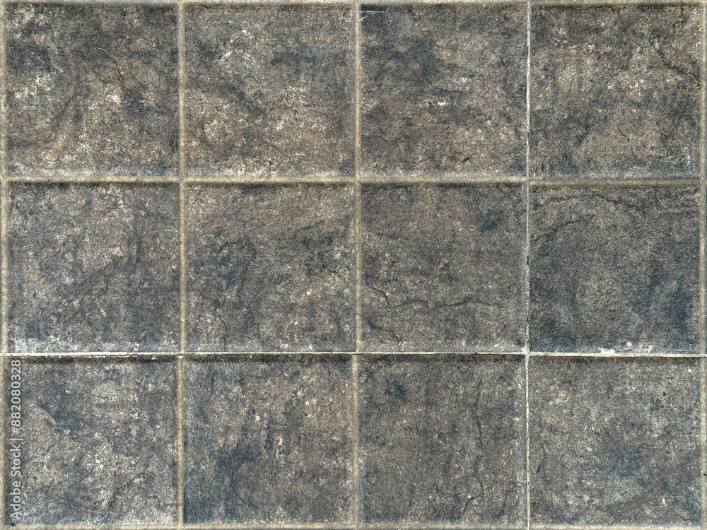 Square dark grey honed ceramic paving stone made of natural cobbles stone for outdoor pavement or car port floors.