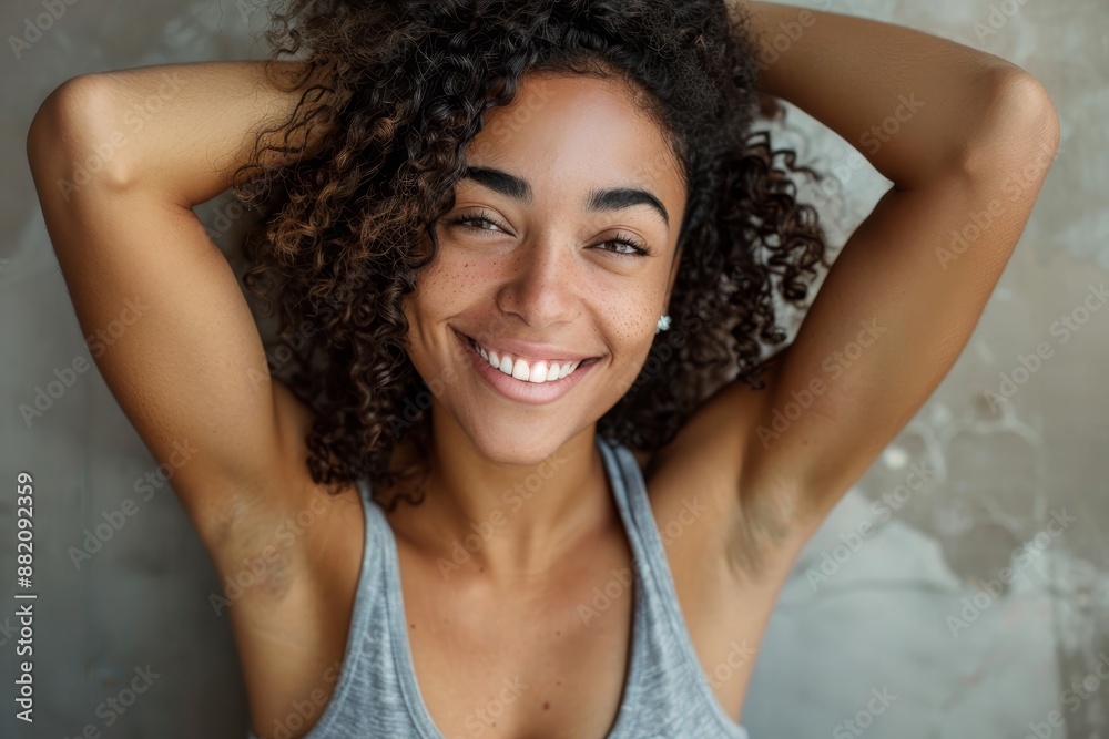 An African woman smiles with happiness in this beautiful portrait An African woman smiles with happiness in this beautiful portrait