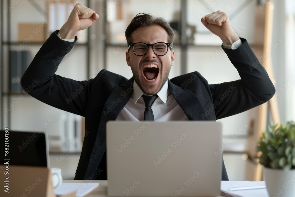 A portrait of a banker manager boss chief employee employer looking at a screen with notifications while smiling and shouting A portrait of a banker manager boss chief employee employer looking at a screen with notifications while smiling and shouting