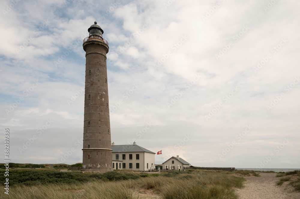 The tall Skagen Grey Lighthouse and centre for migratory birds