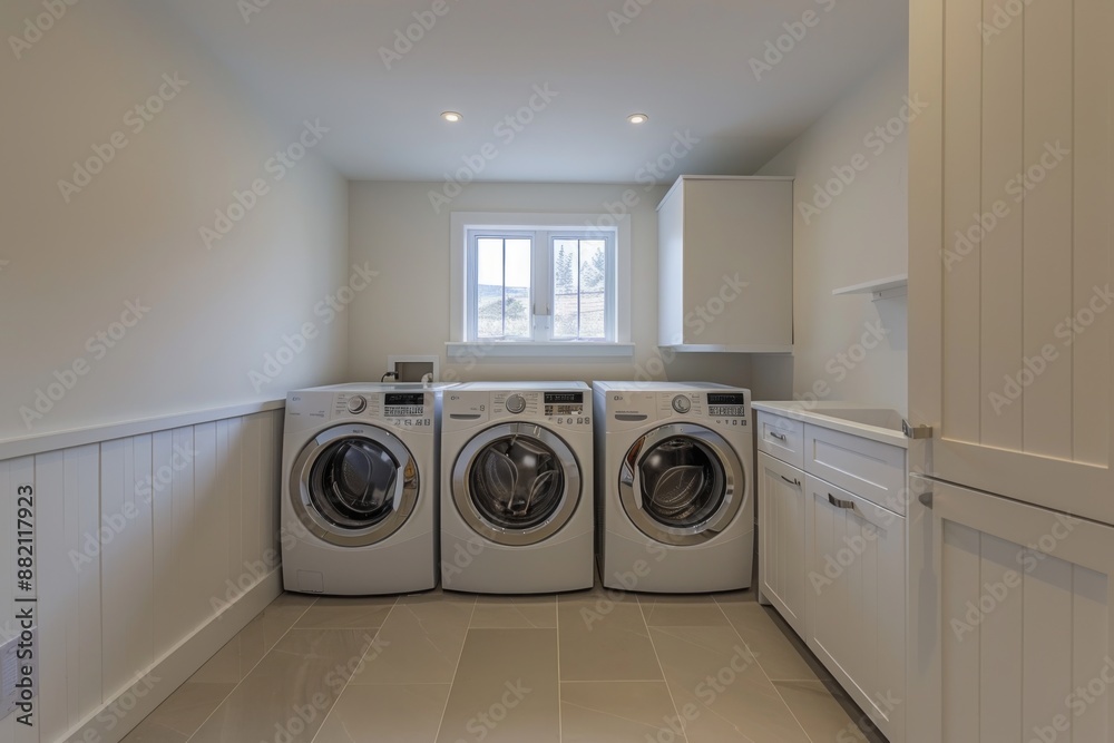 A sleek and organized laundry room featuring modern appliances and clever storage solutions, perfect for maximizing space. The minimalist design creates a sense of calm and functionality. A sleek and organized laundry room featuring modern appliances and clever storage solutions, perfect for maximizing space. The minimalist design creates a sense of calm and functionality.