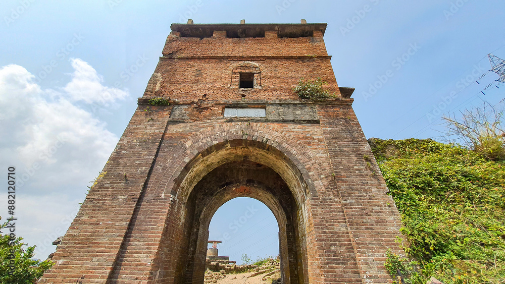Obraz premium A Brick Watchtower At Hai Van Gate Area On Top Of Hai Van Mountain Pass, Vietnam. The Hai Van Gate Was Built On Hai Van Pass In 1826 To Protect The Hue Imperial Citadel.