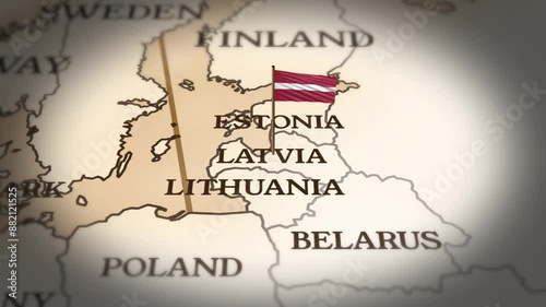 Latvia flag showing on world map with 3D rendering photo