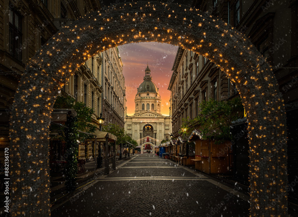 Christmas market at Saint Stephen Basilica in Budapest, with festive lights and holiday charm, Hungary