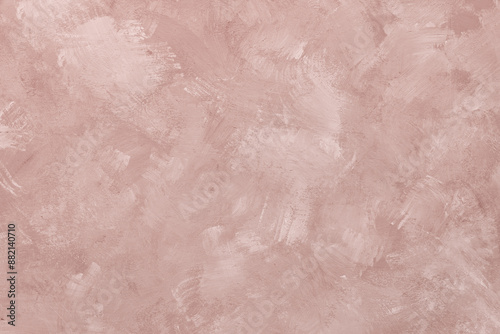 Abstract pink beige painted grungy background. Part of a wall, wallpaper or design element in a pastel tones