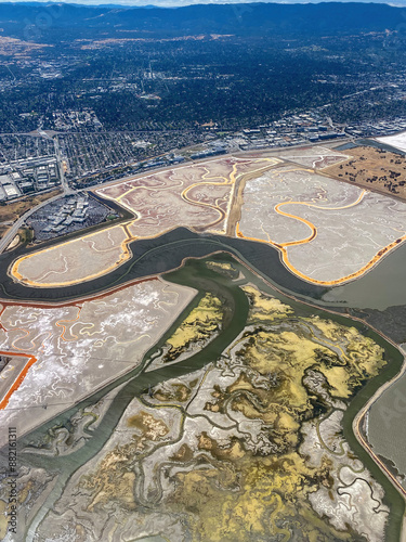 Aerial view of Nature Reservation Bedwell, Menlo Park, California, USA with Meta Headquarter seen from an airplane