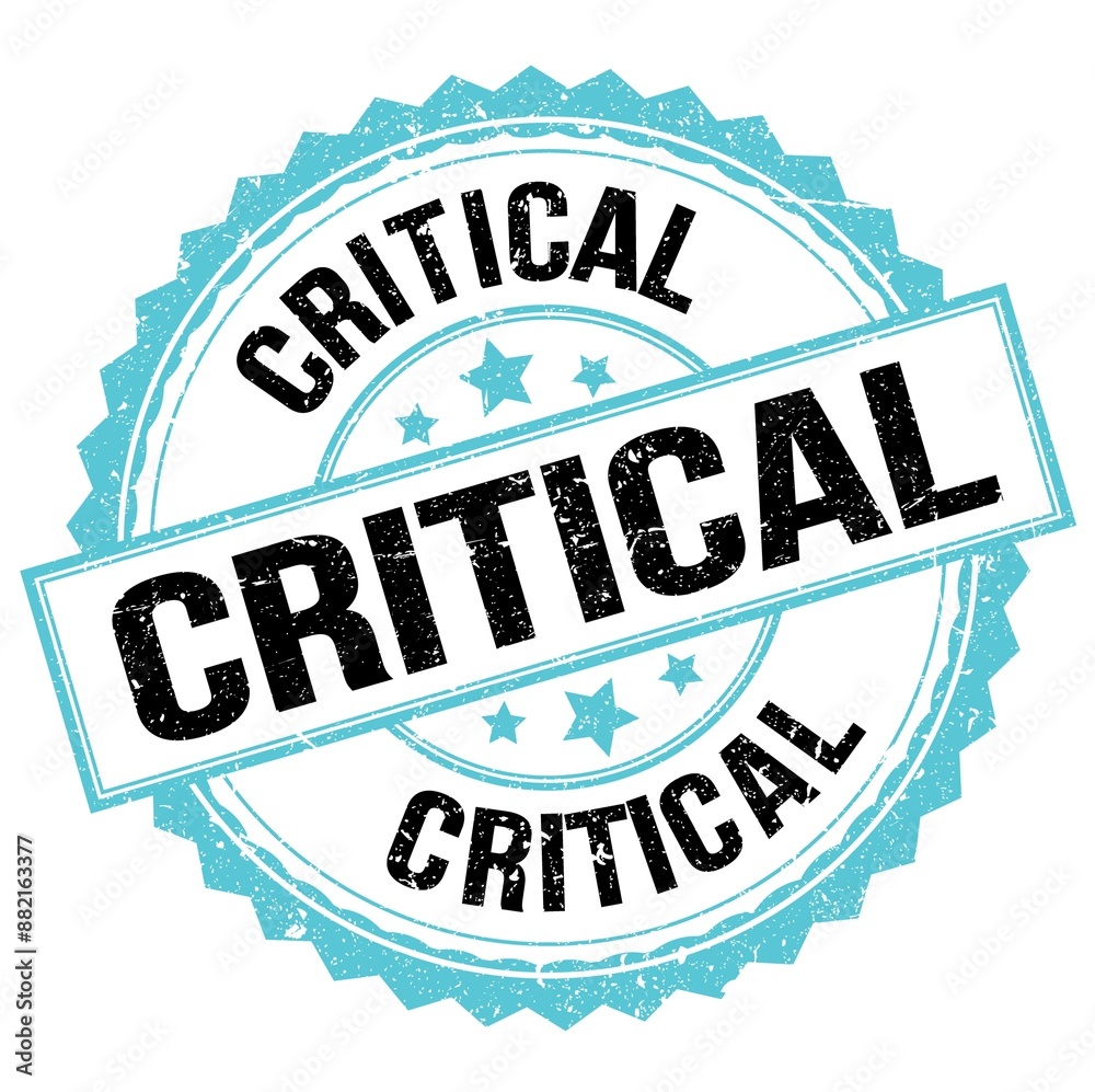 Obraz premium CRITICAL text on blue-black round stamp sign