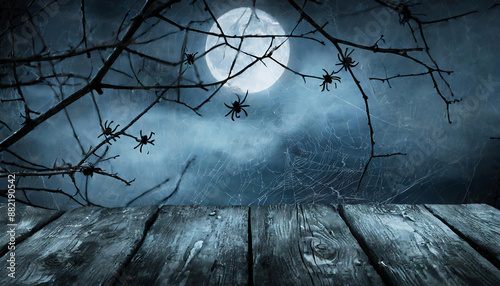 Halloween background with spider webs and dry tree branches in the deep forest. Halloween concept for product display	