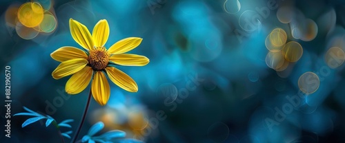 Blurred yellow flower on an abstract bokeh background, creating a cheerful scene