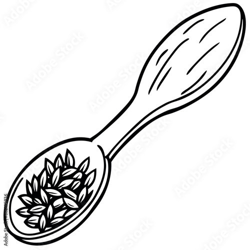 On a spoon, black caraway seeds