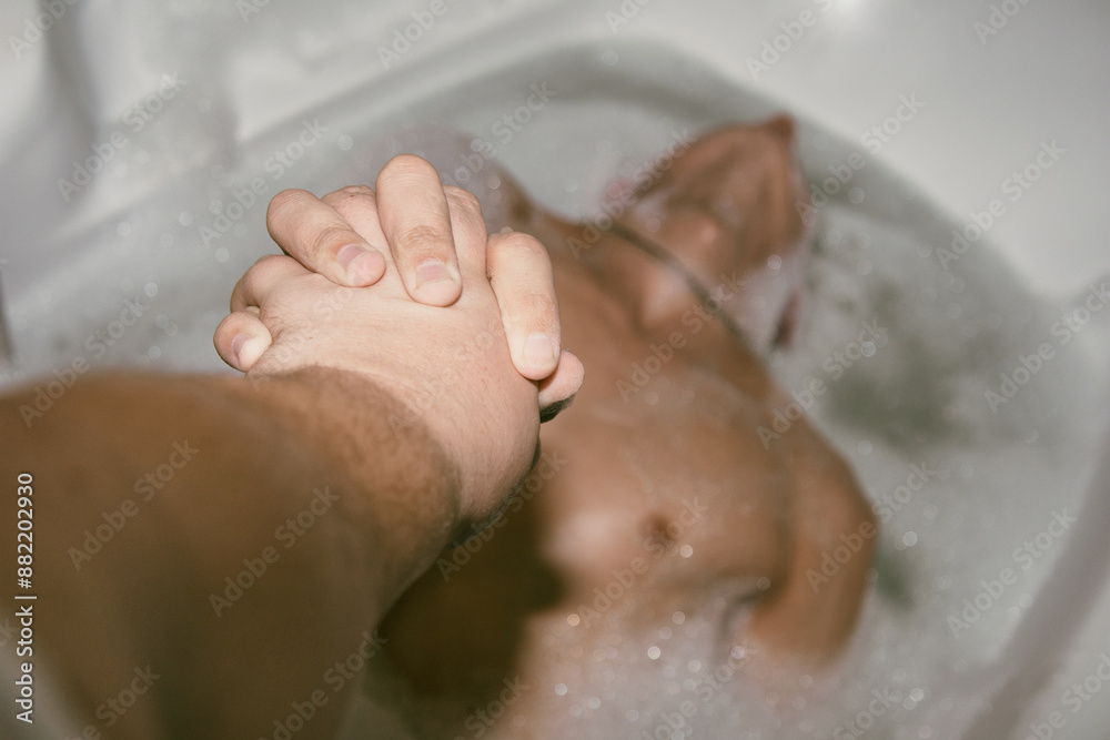 Gay couple washes in the bathroom. Love romantic relationship. Help and support in difficult times. Gay couple washes in the bathroom. Love romantic relationship. Help and support in difficult times.