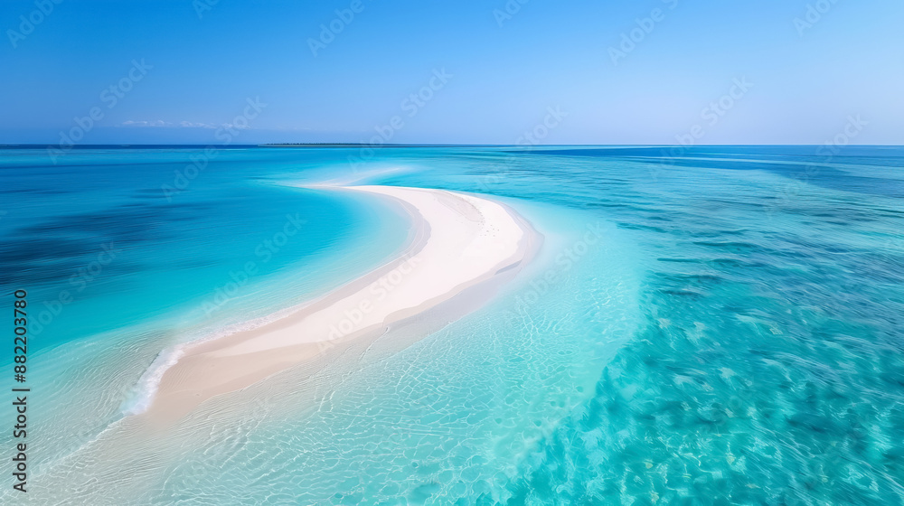 Obraz premium A stunning aerial view of a pristine sandbar in turquoise waters under a clear blue sky, depicting tropical paradise and serenity.