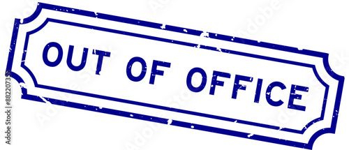 Grunge blue out of office word rubber seal stamp on white background