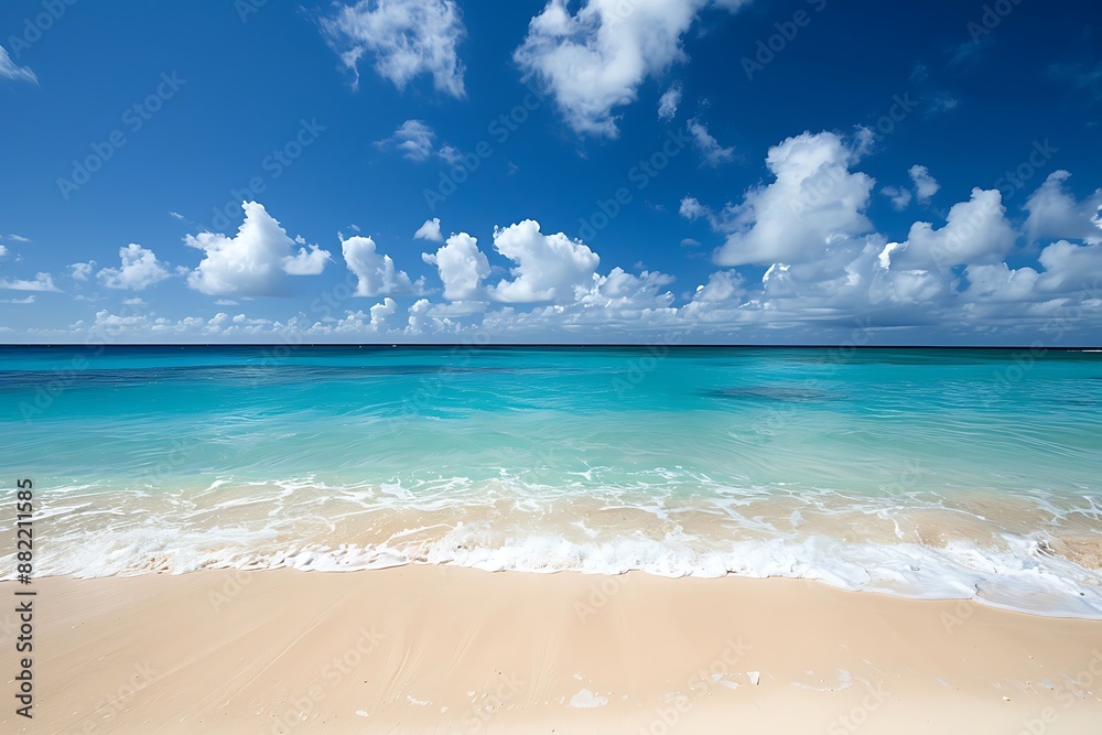 Fototapeta premium Idyllic Beach Scene with Azure Waters and White Clouds