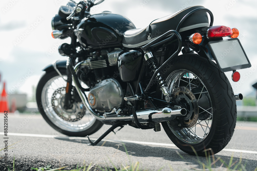 Motorcycle in a sunny motorbike on the road riding.with sunset light. copyspace for your individual text. classic motorcycle. Motorcycle in a sunny motorbike on the road riding.with sunset light. copyspace for your individual text. classic motorcycle.