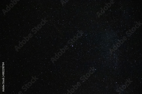a black sky with bright stars and constellations