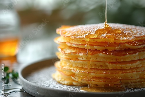 Minimalist mockup of a stack of gluten-free pancakes with honey, with blurred background. Gluten-free pancakes with syrup, gluten-free pancakes with honey, ancient grain food