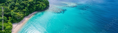 A stunning aerial view of a tropical beach with lush greenery, turquoise waters, and a serene coastline, perfect for a summer getaway. © tinnakorn