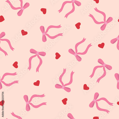 Trendy seamless pattern with ribbon bows and red hearts.