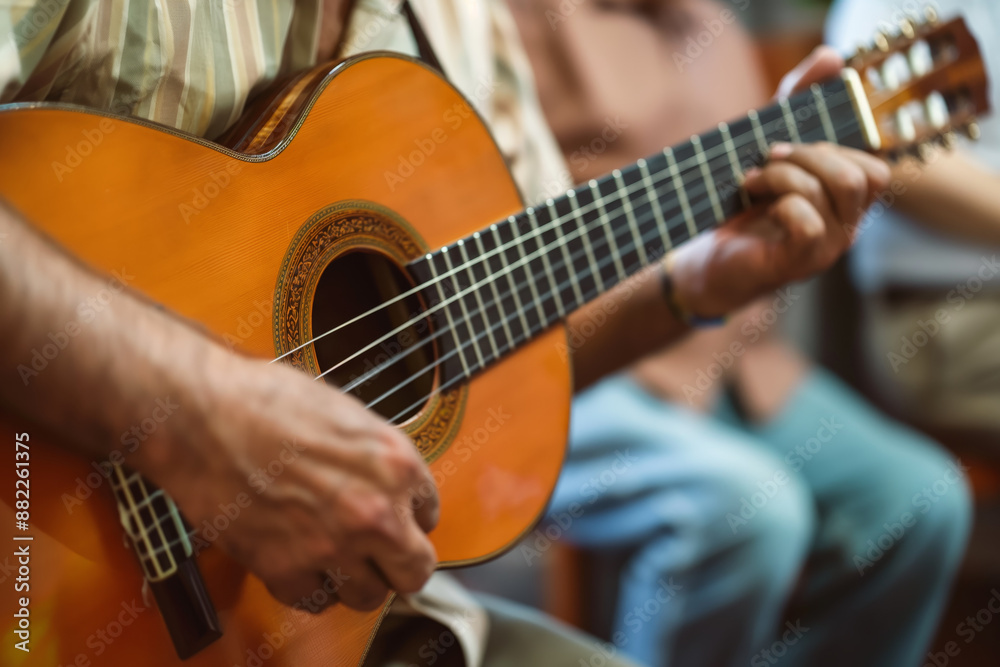 Obraz premium Acoustic Guitarist Strumming Strings During Live Performance in Relaxed Setting