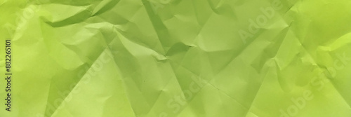 Clean paper, wrinkled, abstract background vector. Parrot green color paper crease or crumpled texture.