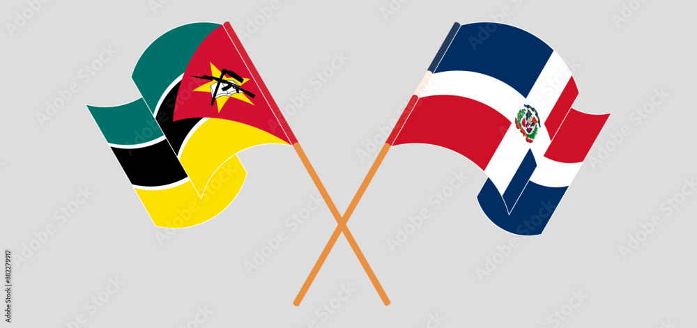 Crossed and waving flags of Mozambique and Dominican Republic. Vector illustration
