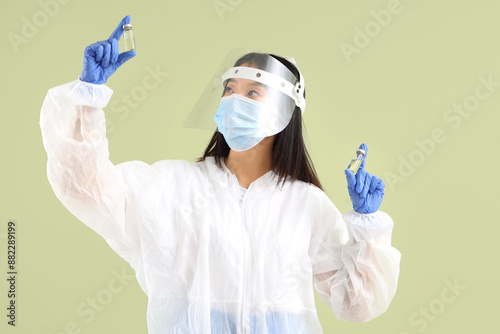 Asian female doctor with am...