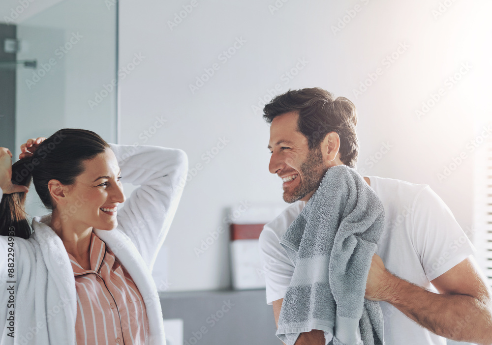 Couple, beauty and happy in bathroom for morning routine with skincare, grooming and haircare in home. People, laughing or getting ready with hygiene preparation, start of day or wellness for wake up Couple, beauty and happy in bathroom for morning routine with skincare, grooming and haircare in home. People, laughing or getting ready with hygiene preparation, start of day or wellness for wake up
