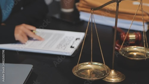 female business woman lawyers working at the law firms. Judge gavel with scales of justice. Legal law, lawyer, documents, advice and justice concept. photo