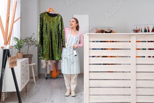 Young female worker with li...