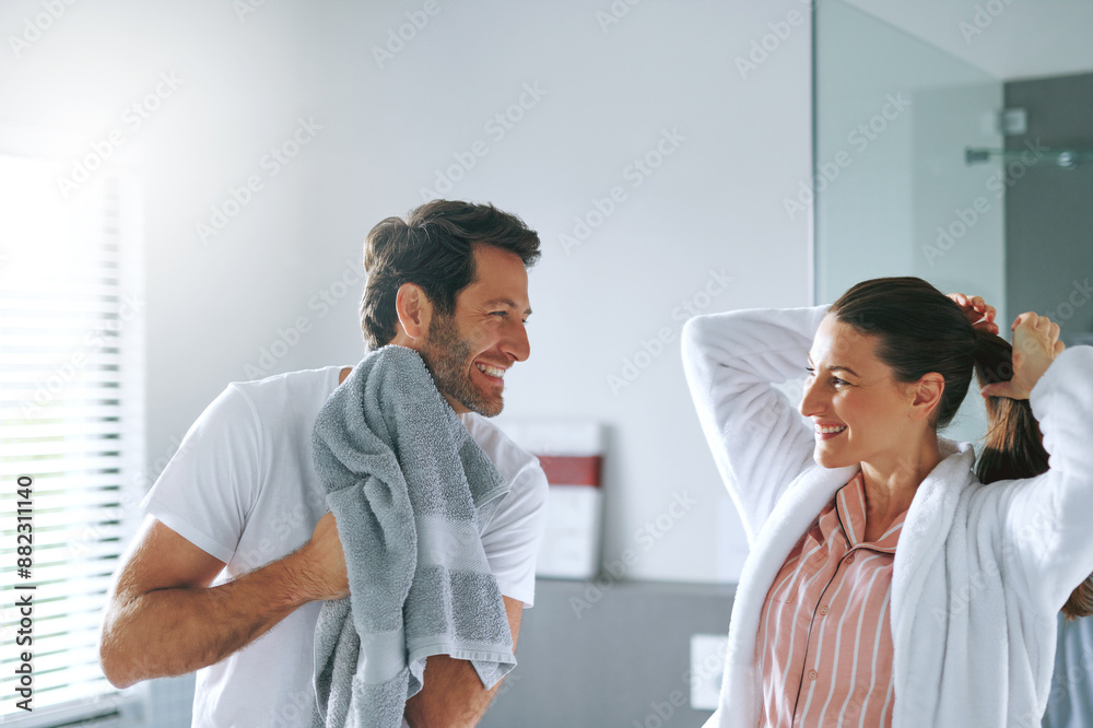 Couple, cosmetics and smile in bathroom for morning routine with skincare, grooming and haircare in home. People, happy or getting ready with hygiene preparation, start of day or bonding with wake up Couple, cosmetics and smile in bathroom for morning routine with skincare, grooming and haircare in home. People, happy or getting ready with hygiene preparation, start of day or bonding with wake up