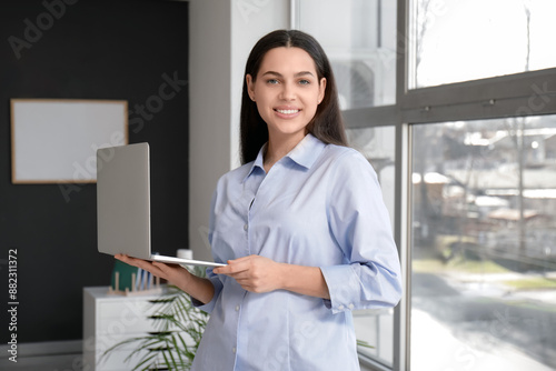 Pretty businesswoman with l...