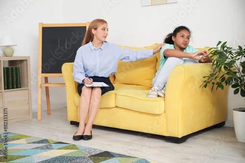 Female psychologist working...