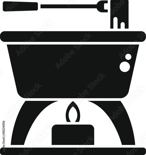 Classic fondue pot is being warmed by a small lit candle underneath, ready for dipping