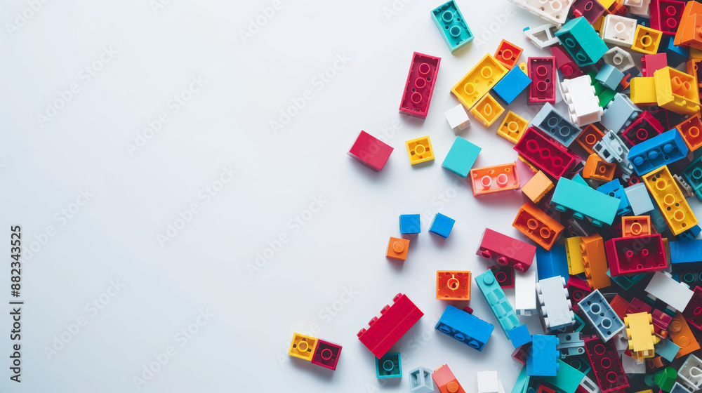 colorful toy building bricks on white background, with copy space colorful toy building bricks on white background, with copy space