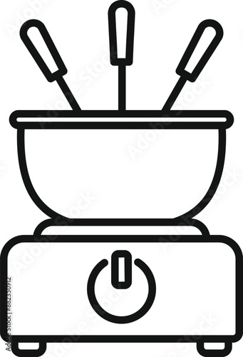 Electric fondue pot is heating up, ready for dipping delicious treats