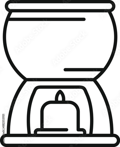 Candle burning under round pot for cooking fondue with chocolate or cheese