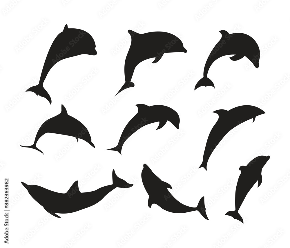 Fototapeta premium vector hand drawn dolphin silhouettes set in various poses